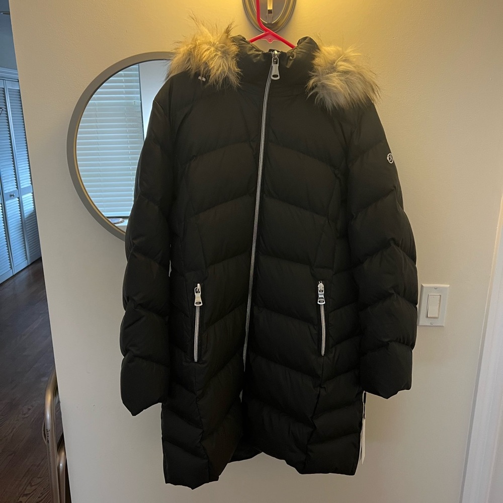 Calvin Klein black puffer jacket with faux fur trim.